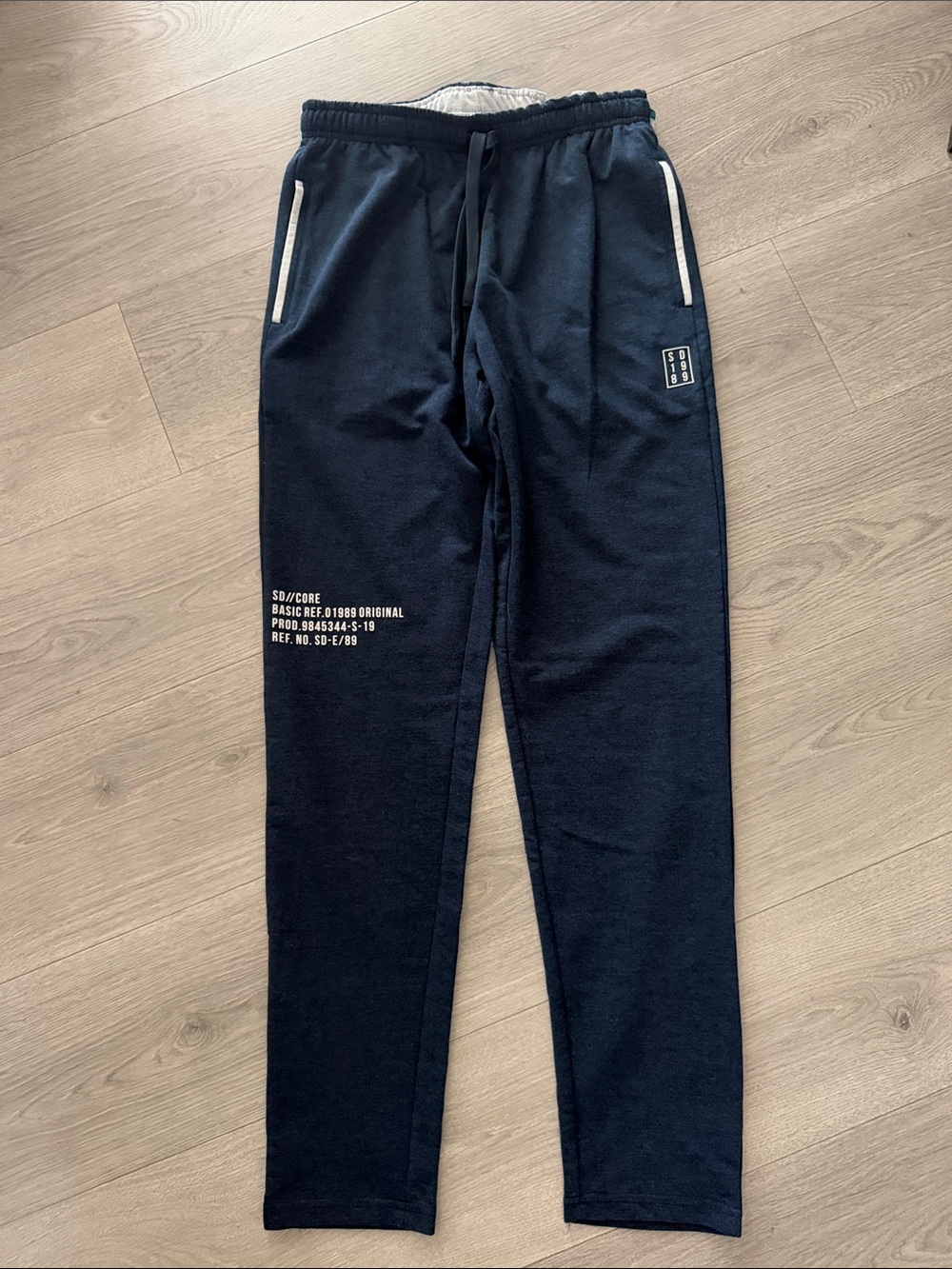 Men's Navy Joggers with White Trim and Graphic Detail